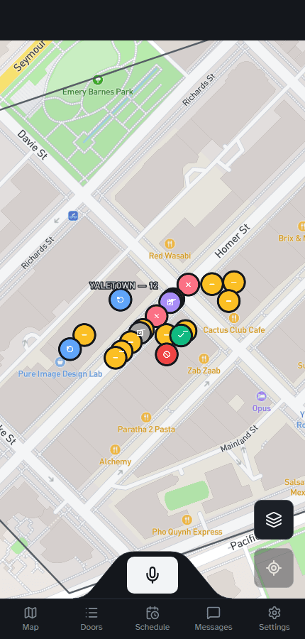 Territory map with coloured door pins along a Vancouver block, a drawn territory boundary, and a microphone dock
